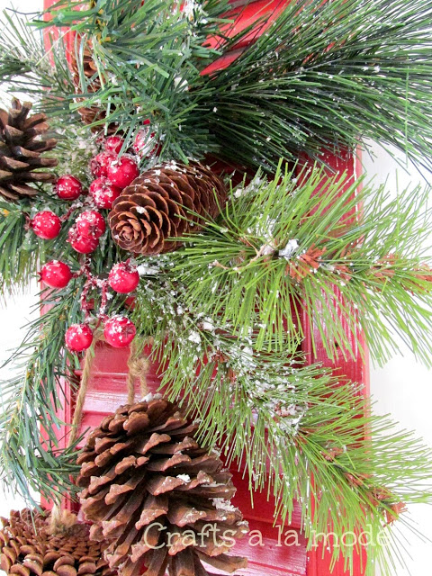 pine cones and red shutter