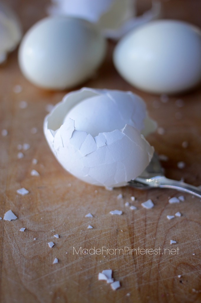 How To Peel An Egg With a Spoon - Shell peels off as you work the spoon around the egg