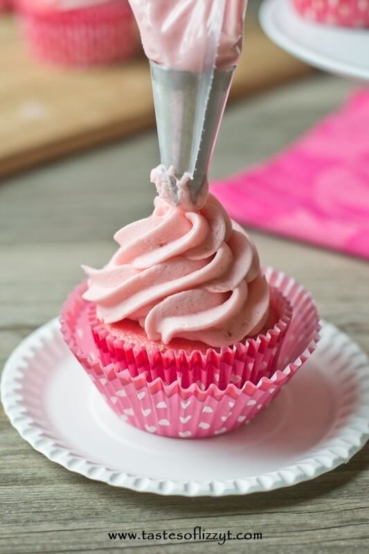 Adding a little strawberry jam into the buttercream frosting  makes a huge difference with these moist Strawberry Buttercream Cupcakes.