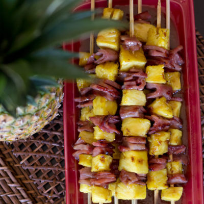 Glazed Ham and Pineapple Kabobs - This appetizer is quick and easy to make. The brown sugar coconut glaze is what makes these kabobs truly amazing. They are the perfect addition to any BBQ!