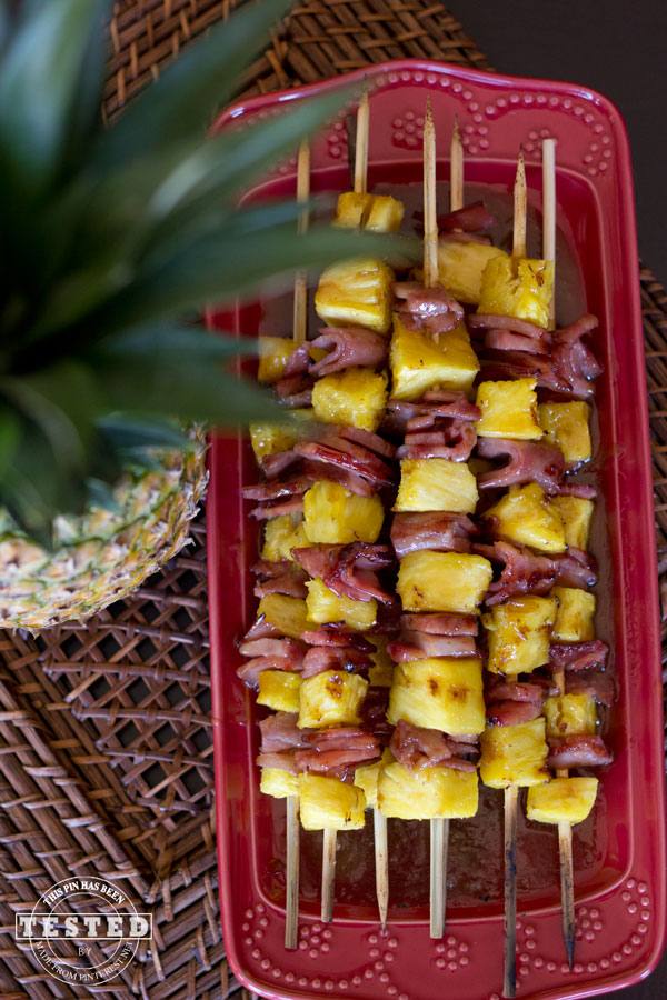 Glazed Ham and Pineapple Kabobs - This appetizer is quick and easy to make. The brown sugar coconut glaze is what makes these kabobs truly amazing. They are the perfect addition to any BBQ!