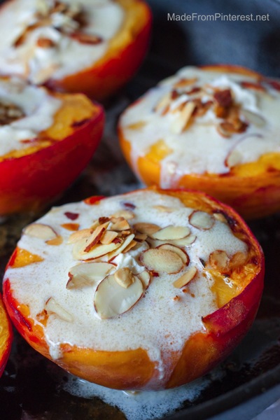 Baked Peaches and Cream delicious with toasted almonds, marscapone cream sauce and a sprinkle of cinnamon sugar