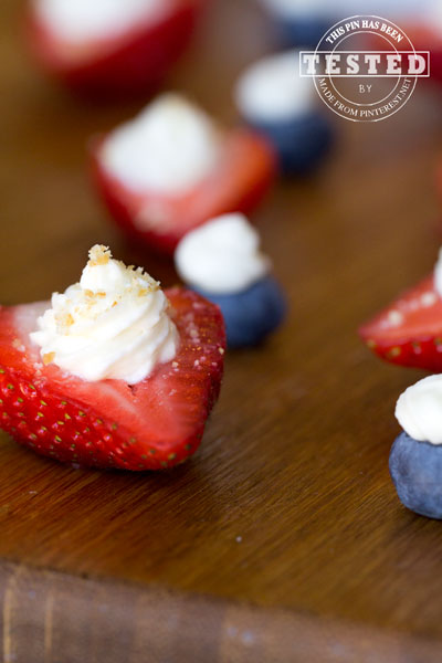 Deviled Berries - Strawberries, raspberries and blueberries filled with a lemon cream cheese and whip cream filling. The lemon flavor really gives this light fruit filling the perfect tangy flavor!