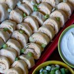 Buffalo Wing Pinwheels - These tortilla buffalo pinwheels are amazing, they are bursting with bold wings flavor, blue cheese and green onions. Quick and easy to make!