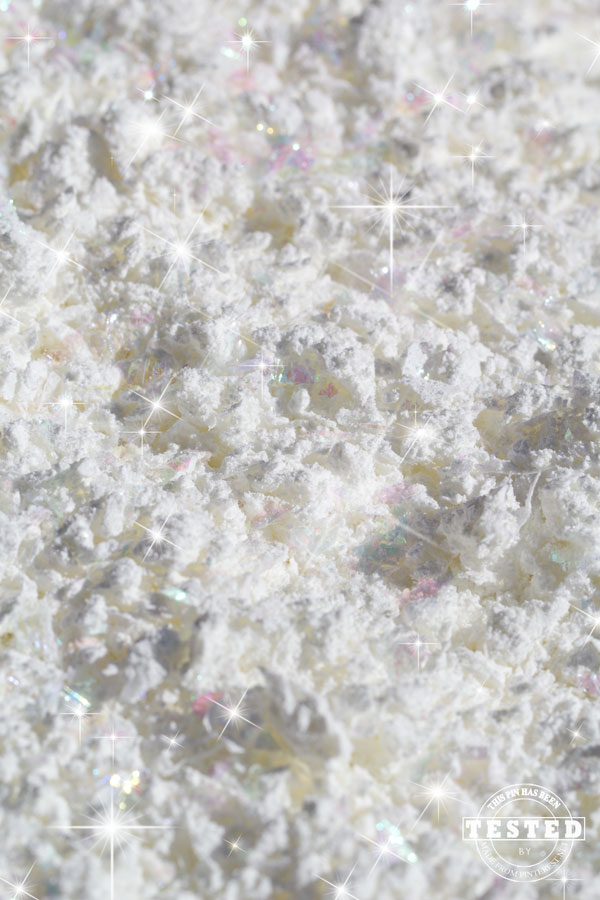 DIY Sparkle Snow - This quick and easy recipe makes the lighest, fluffiest sparkle snow. It easily compacts to make snowballs and snowmen!