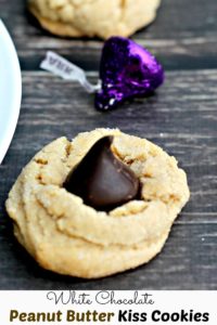 White Chocolate Peanut Butter Kiss Cookies| Soft white chocolate peanut butter cookies complimented with a dark chocolate kiss.