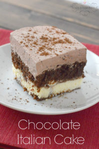 Chocolate Italian Cake with a sweet and creamy cheese layer and topped with a whipped chocolate frosting!