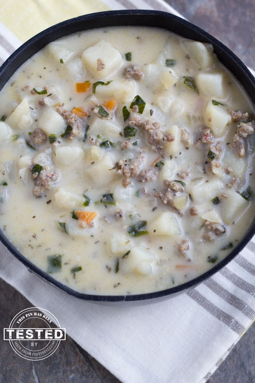 Italian Sausage Soup Recipe - Chock-full of spinach, sausage and potatoes, this hearty soup is delicious and quick to make. You may want to make a double batch, it freezes up perfectly!