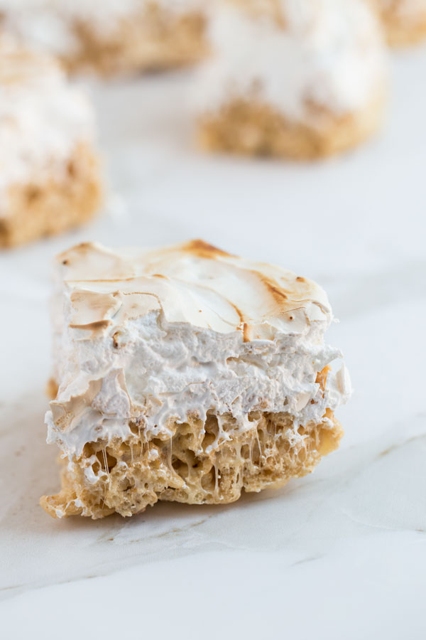 I have a new way to enjoy classic Rice Krispie treats! These cannot be described as simple, they are outrageously, wickedly decadent. The extra effort required to make them is worth it, sharing them with everyone you know will earn you the title "Culinary Goddess"!