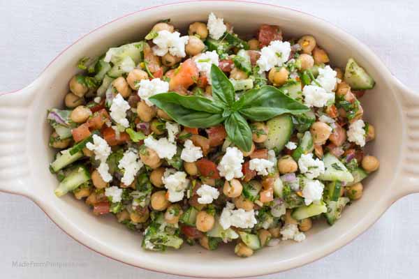  Looking for the perfect side to go with dinner? Found it! Cucumber Tomato Chickpea Salad is delicious! 