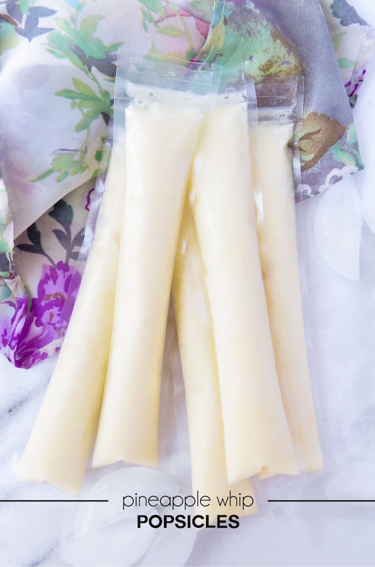 A copycat recipe of Disneyland's dole whip ice cream turned into pineapple whip popsicles! An easy DIY popsicle treat or snack idea.