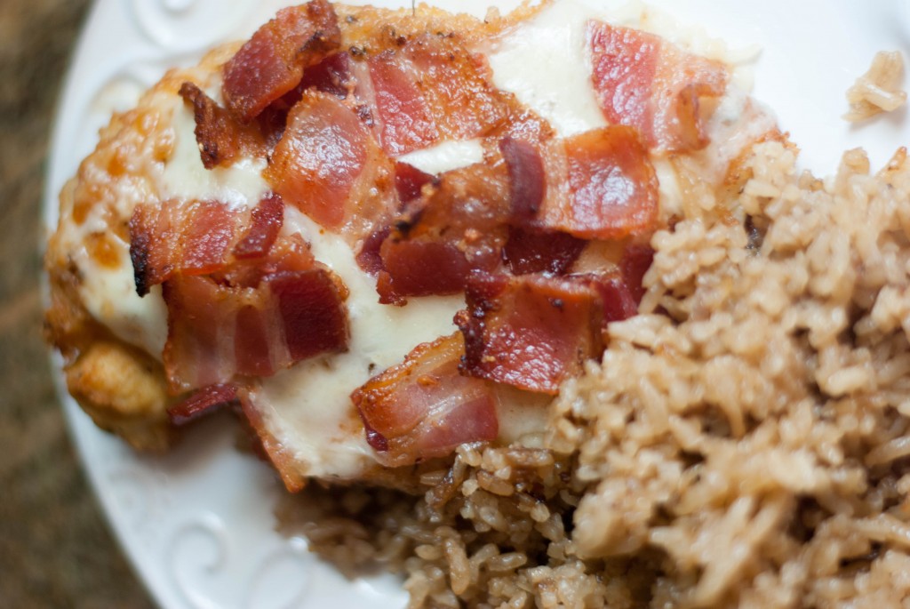 An easy recipe for moist chicken topped with cheese and bacon. Oh yes, I said bacon.