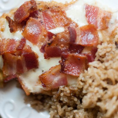 An easy recipe for moist chicken topped with cheese and bacon. Oh yes, I said bacon.