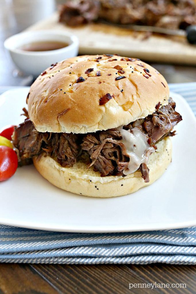 Served on an onion roll for another level of flavor and topped with melted Swiss for a mouthwatering roast beef sandwich