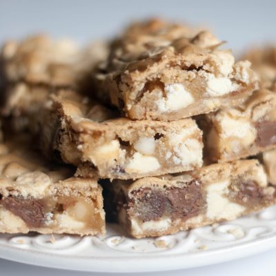 Chunky and chock full of chocolate and macadamia nuts, you are definitely going to want this Blonde Brownies Recipe!