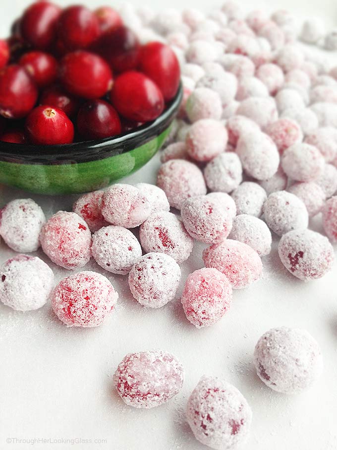Festive Sugared Cranberries. Bursting w/flavor that pops in your mouth. Sweet & tart. Tangy & addictive. Perfect garnish, snack, stocking stuffer and gift.