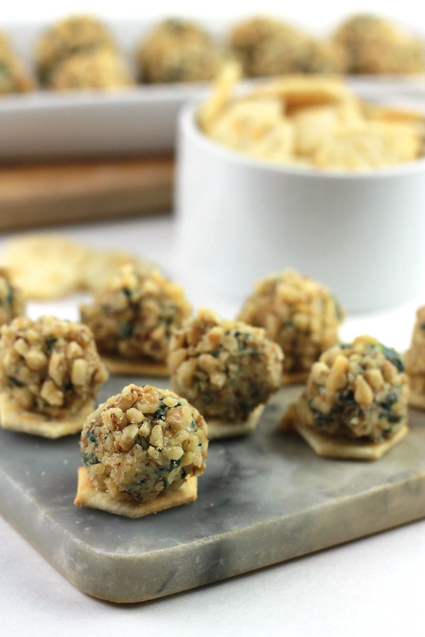 Insanely delicious bite sized Spinach Cheese Balls are easy to make and even easier to eat. A perfect addition to your Game Day menu.