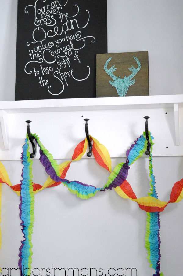 DIY Ruffled Streamers Tutorial by Amber Simmons of ambersimmons.com | These easy handmade party decorations add a little something extra to any occasion. Make for birthdays, holidays, the Superbowl, or make them in your favorite colors for everyday decor. They also make super cute backdrops for all your special photos.