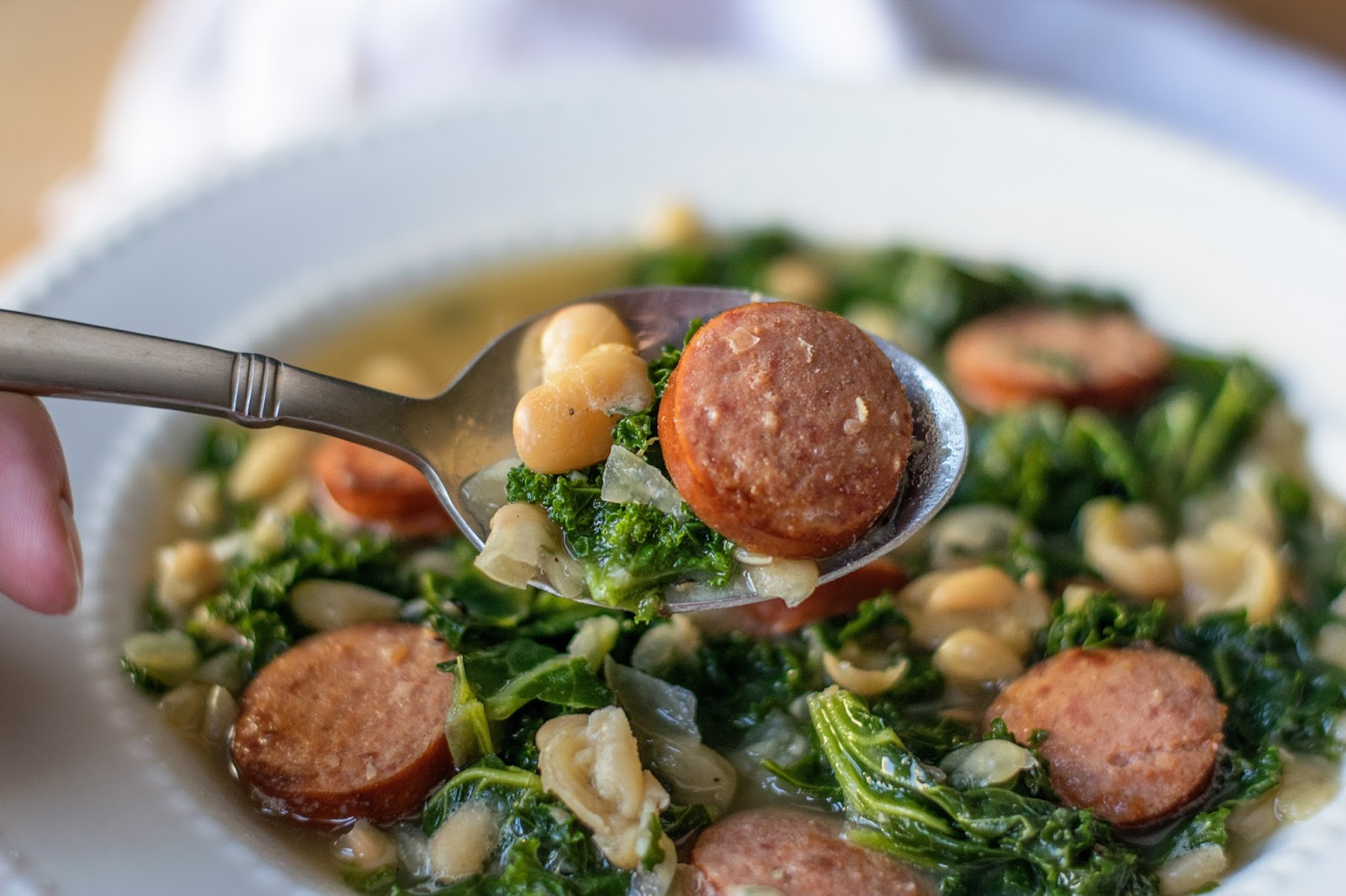 This White Bean, Sausage, and Kale Soup Recipe is so simple, so filling, and so delicious and is perfect for this unexpected early spring winter weather.