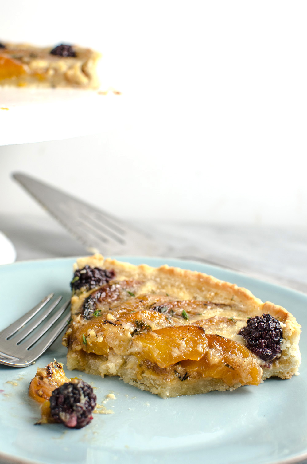 Cheddar, Caramelized Peach and Thyme Tart - A wonderfully fruity, tangy creamy fruit tart! A unique flavor profile that will wow your guests and perfect for any season!