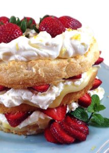 Lemon Cream Strawberry Angel Food Cake: angel food cake layered with lemon curd, lemon cream, and fresh strawberries for a light and airy dessert.