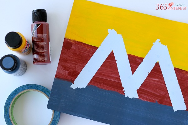 Tape Resist Letter Art is an easy DIY craft that makes a great personalized gift. It is perfect for Mother's Day!