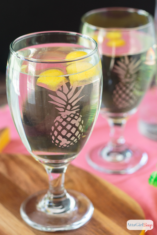 These DIY Etched Pineapple Glasses are a great way to get a high-end look for a reasonable price. They're perfect for a beach-themed party!