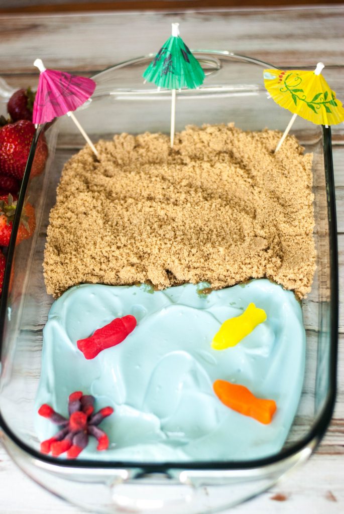 Can't get to the beach? You can at least dream about it with this darling Beach Theme Fruit Dip. People love dipping fruit into the "ocean" then into the "sand". Everyone will think that you are SO creative!