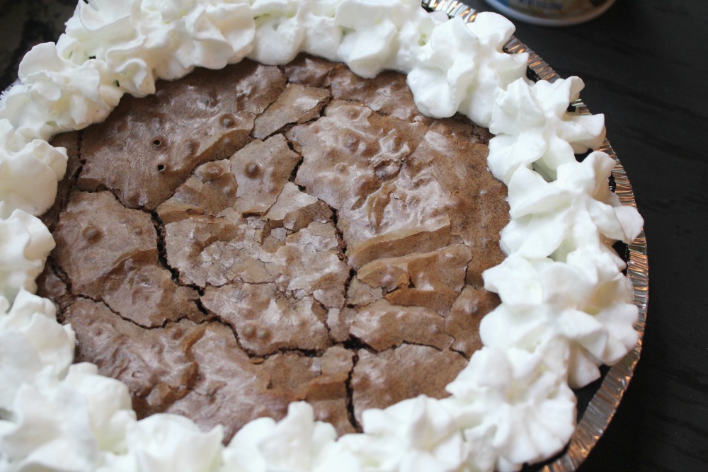 This Oreo Brownie Pie combines three of the best desserts ever -- Oreos, chocolate brownies, and pie! 