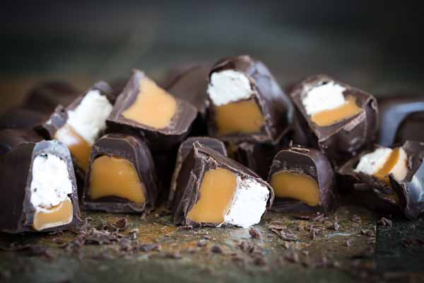 These Ice Cube Tray Chocolates are SO fun and easy to make! Within minutes you can have a filled chocolate candy to give as gifts or to keep for yourself. I made a ton in one afternoon and will definitely be making more.