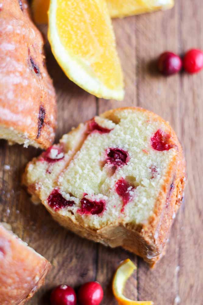 This Cranberry Orange Pound Cake is an easy holiday dessert. The orange citrus is a subtle flavor to compliment the tiny red bursts of Christmas joy!