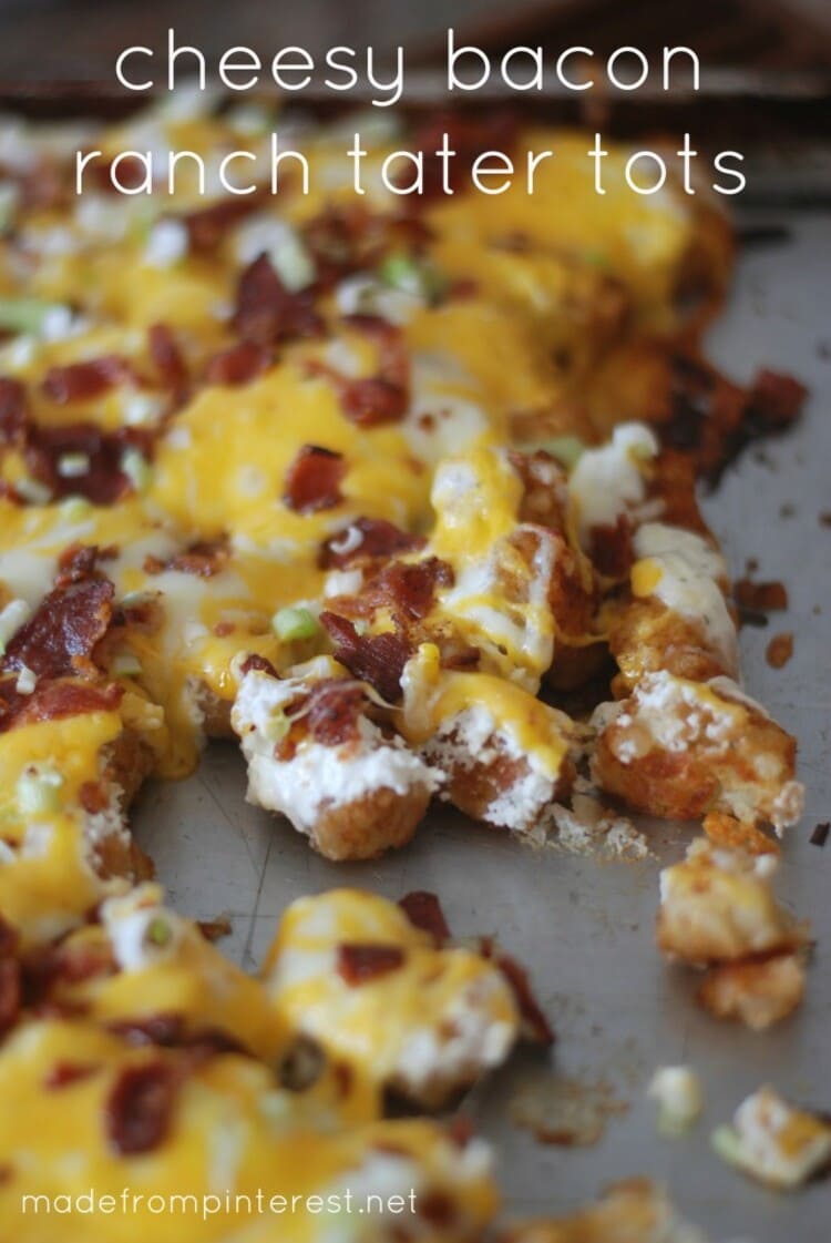 Yummy looking ready cheesy bacon ranch tater tots with melted cheese and cooked bacon bites