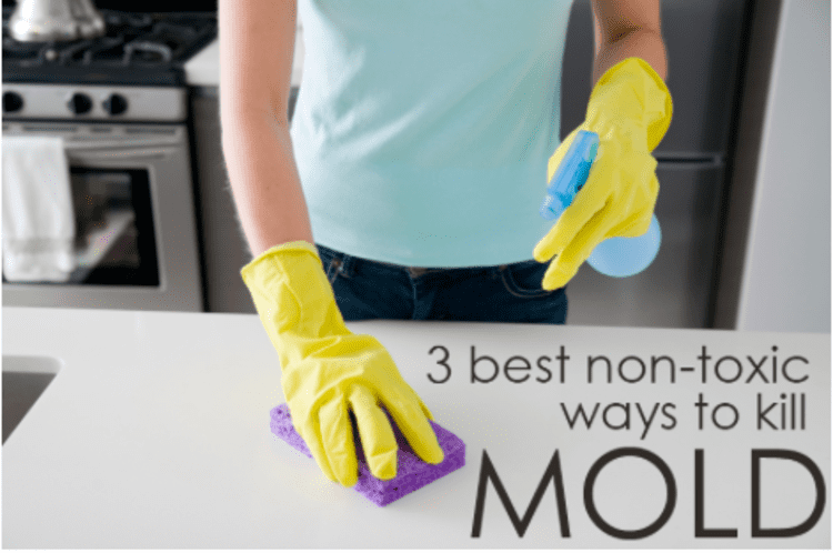 hydrogen peroxide non-toxic ways to kill mold a man cleaning the to of a kitchen counter wearing a yellow gloves, blue T-shirt and jeans