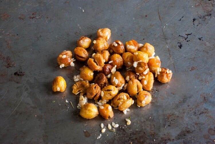 Roasted chickpeas recipe chickpeas with sesame on black background