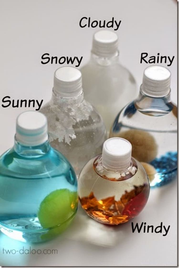 five bottles themed according to different weathers to make sensory weather bottles