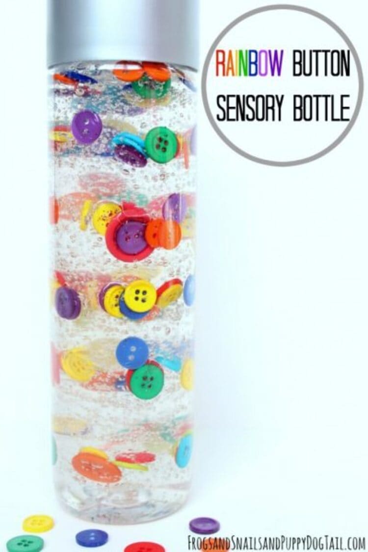 A bottle filled with rainbow colored buttons to stimulate senses