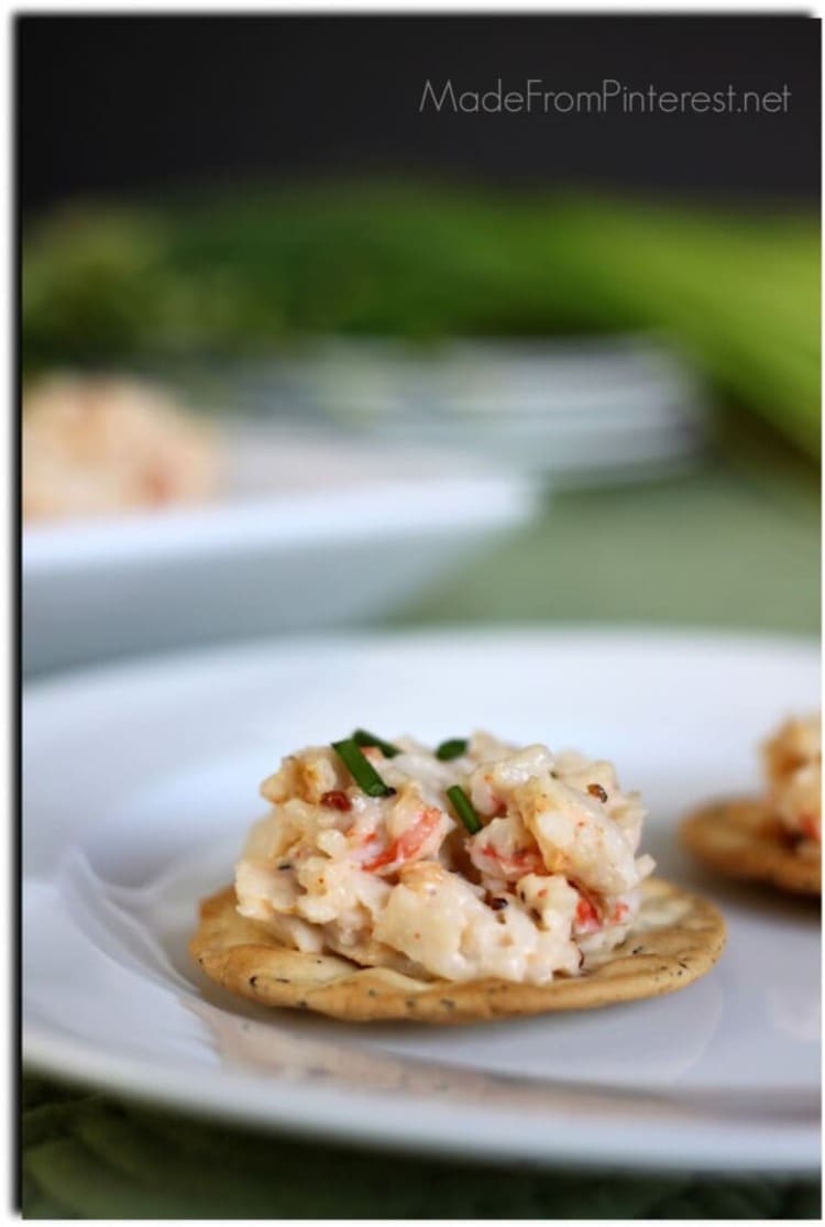 Plate with crab dip served with some tortillas