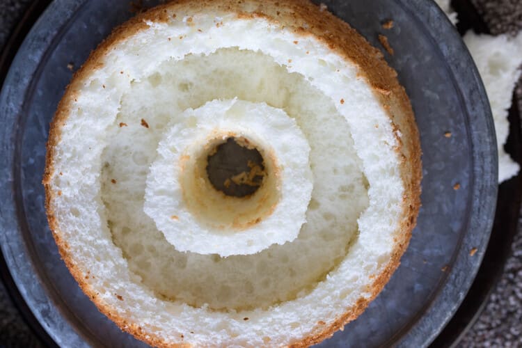 Angel food cake with a center hole and round outer edge 