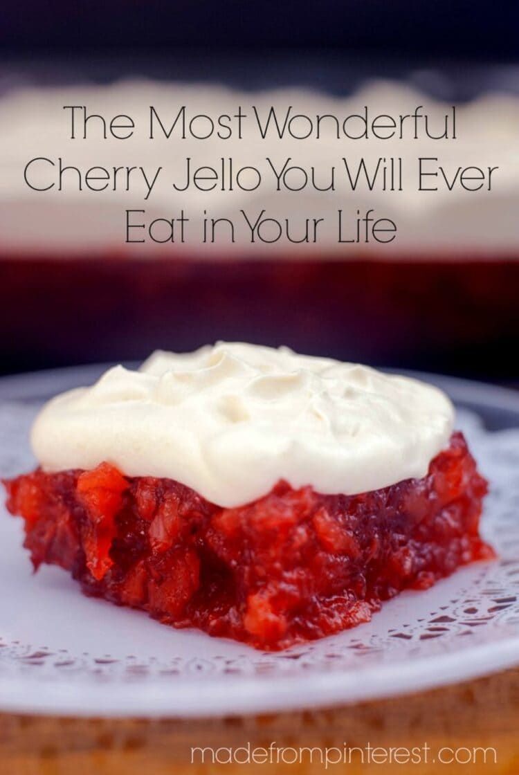 The Most Wonderful Cherry Jello You Will Ever Eat in Your Life. That's really the name of the recipe and it's the truth. A cherry jello on a plate with cream on top.