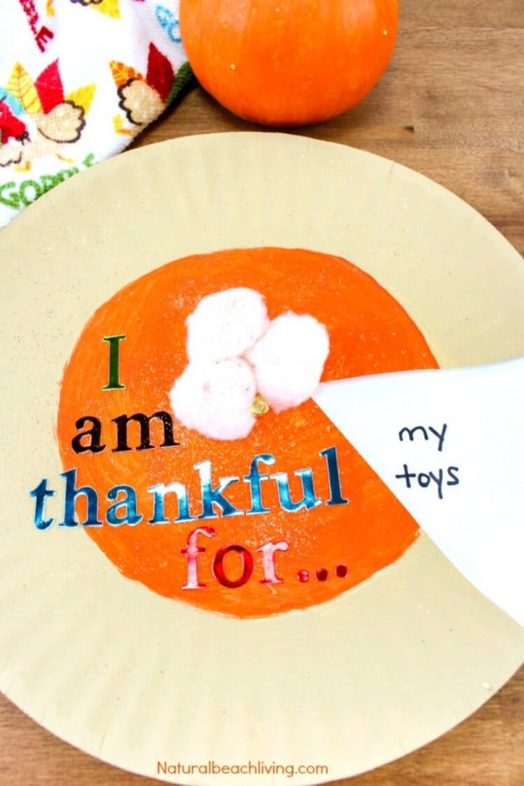 paper plate craft thanksgiving plate on a wooden surface